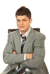 Young manager on chair