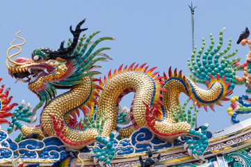 Fototapeta premium The Dragon status on roof of joss house