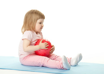 Obraz na płótnie Canvas Baby girl with a ball