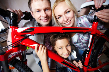 Family with mountain bike