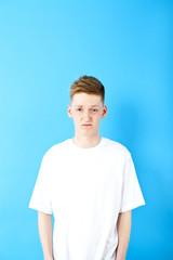 Young man on blue background