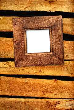 Old frame on wooden wall