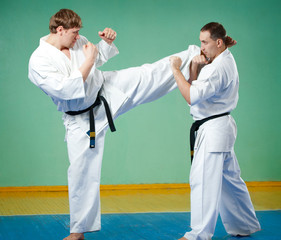 Karate fighters in action