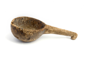 Antique wooden scoop with white background.
