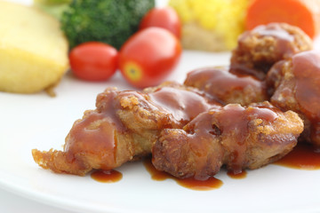 Fried Chicken with tomato sauce and vegetable
