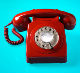 Red Phone on Blue Background