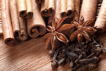 Herbs and Spices over wooden background