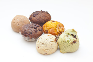 Baked cakes on white background