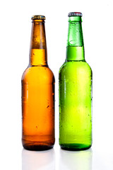 Green and brown beer bottle with drops drink without label on a