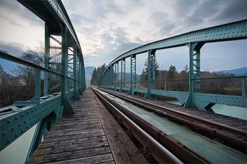 railway train bridge with cyan painted steel framework