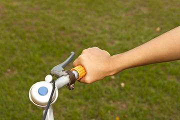 handle orange bicycle and blue bell