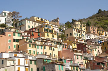 Four colorful houses with blue sky