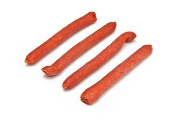 Hungarian spiced sausage isolated on a white studio background.