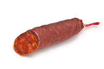 Chorizo De Pueblo sausage isolated on a white studio background.