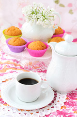 Still Life with a cup of coffee and cupcakes