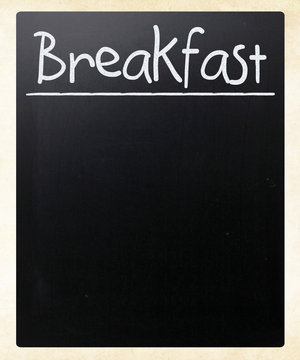 "Breakfast" handwritten with white chalk on a blackboard