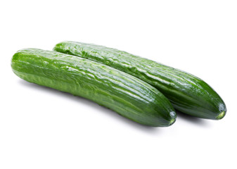 Fresh cucumbers isolated on white