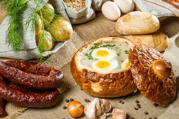 Sour soup served in bread with egg on Easter