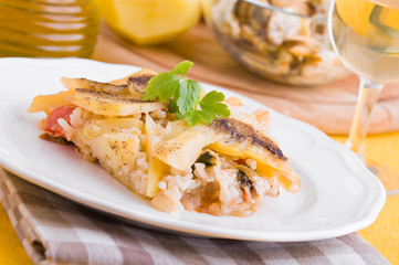 Rice, potatoes and mussels. Tiella di riso, patate e cozze.