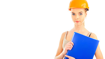 Woman wearing protective helmet holding new key