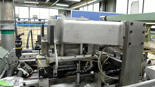 book cutting machine cutting stack of copies