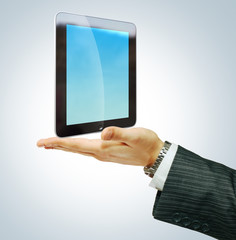 Tablet Computer  on businessman hend