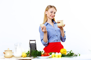 Woman cooking fresh meal at home