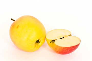 half and whole apple isolated