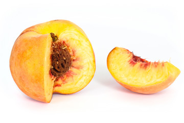 ripe whole peach and segment isolated on white