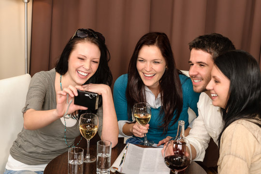 Happy people having fun drink at restaurant
