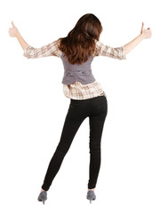 Back view of of beautiful brunette woman in jeans