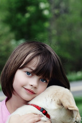 Child and Her Puppy