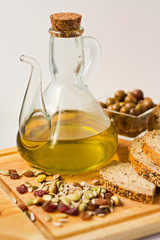 Jug of Olive Oil with Olives.