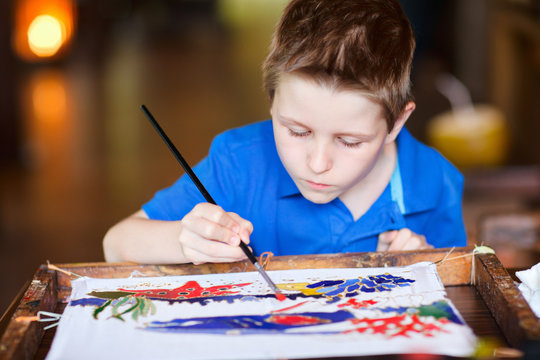 Boy Painting A Batik