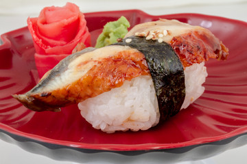 Eel sushi. Isolated over white.