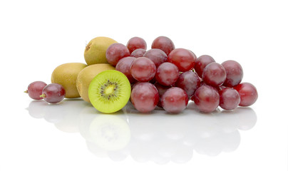 kiwis and grapes on a white background