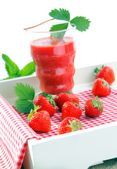 Fresh strawberries and strawberry juice