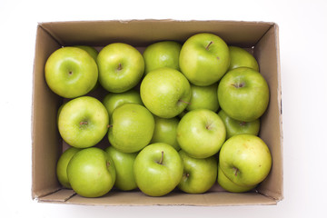 box with green apples