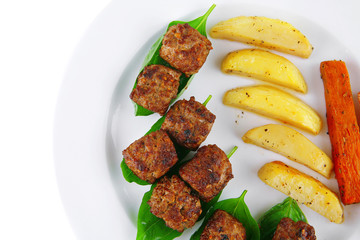 grilled meatballs on white