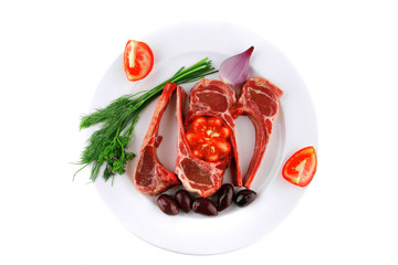 fresh raw ribs on plate