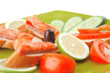 sandwich with salmon on green