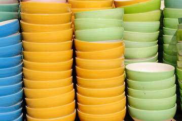 ceramic cups in a basket at the fair