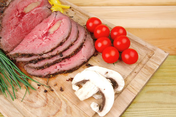 hot ham on wooden table
