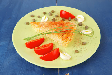vegetable casserole piece over white plate