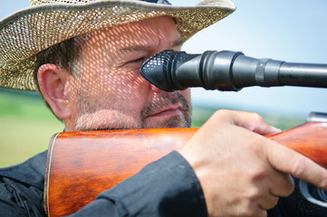 adult hunter aiming