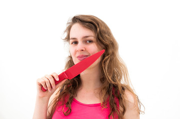 woman is holding a knife