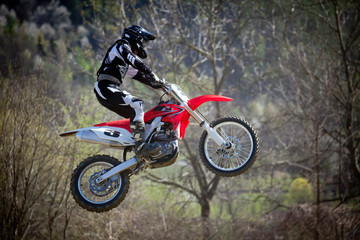 Naklejka premium salto con moto da cross