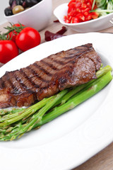 fillet with asparagus , pasta portion
