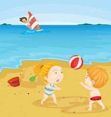 Obraz na płótnie Canvas Kids playing at beach