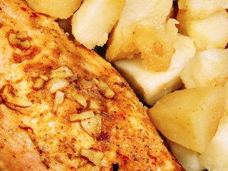 Chicken with spices and fried potatoes